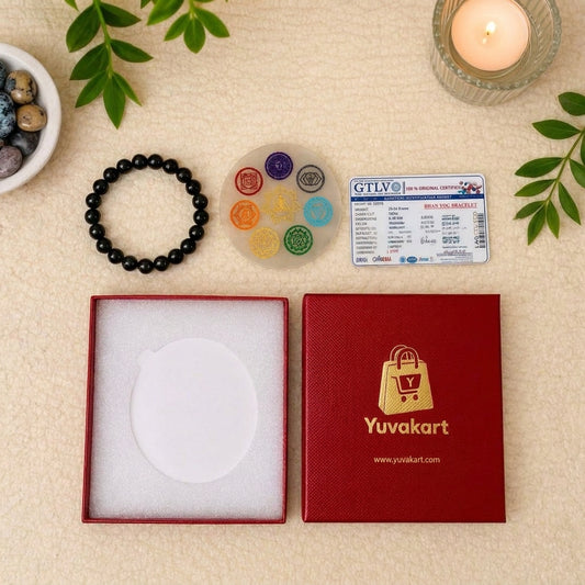 Yuvakart branded box with a bracelet, colorful stones, and a card on a beige surface.