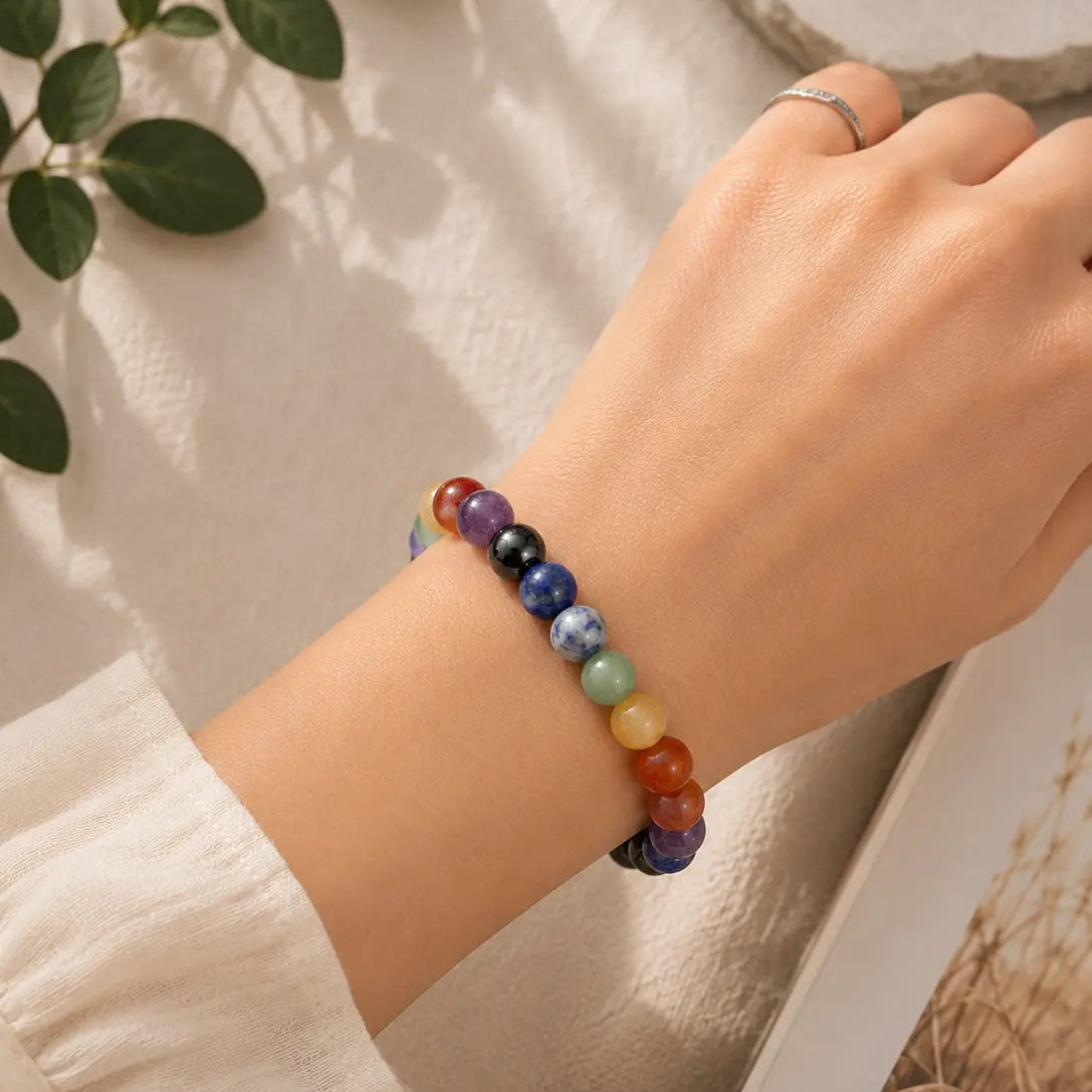a girl wearing 7 chakra bracelet on her wrist
